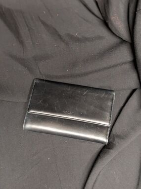 Coach Black Leather Fold Wallet with Embossed Logo